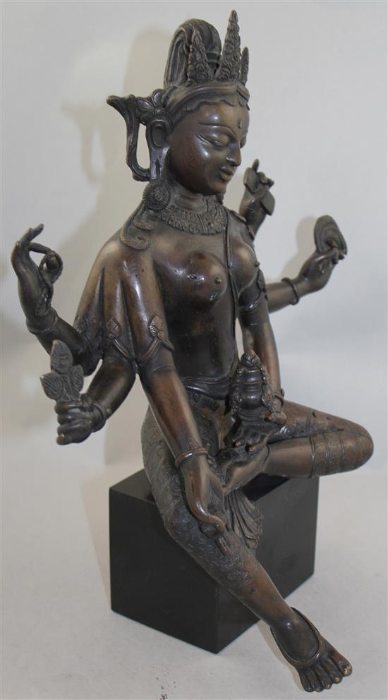 A large Nepalese bronze figure of Vasudhara, 19th century, 34.5cm